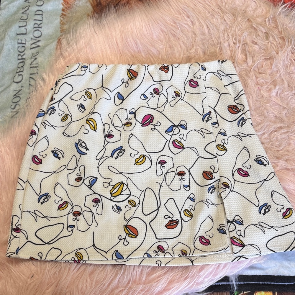 Rainbow White Mini Skirt with Abstract Multi-Face Print